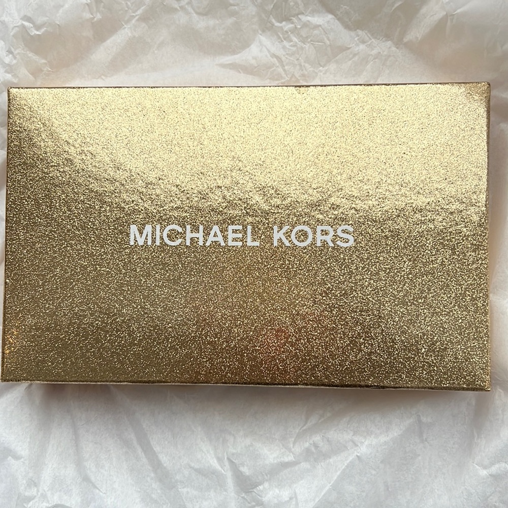 NWT Michael Kors gorgeous wallet. Never out of the box. Brown w/gold stripe.